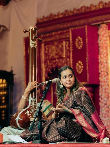 Interacting with my fellow musicians on stage at Sree Ramaseva Mandali. These smiles and shared glances are part of the musical conversation we have during a concert.