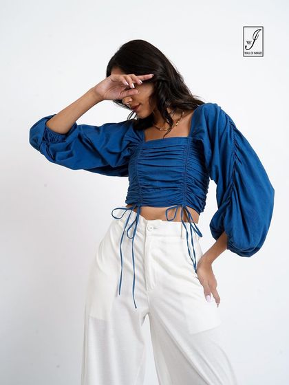 Another detail-oriented pose, perfect for showcasing the texture and fit of the garment for an e-commerce product page.