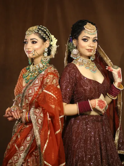 Two of my brides, back to back, showcasing two different styles of bridal makeup and hair.