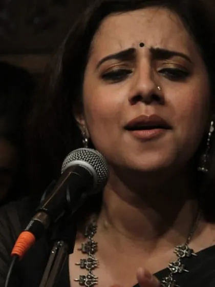 The expression on an artist's face tells the story of the raga. Here, guest artist Smt. Tanushree Kashyap Sharma is completely immersed in her vocal recital at our academy, demonstrating the profound connection between emotion and melody.