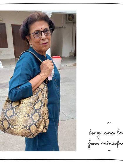 Anubha from Mirzapur with her Long Ana in Mud Safari. This bold, exotic print makes it a fantastic travel bag.