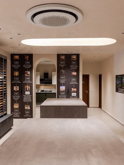 The journey of our 20 years in India is displayed alongside our material library in the Delhi showroom, telling the story of our brand's evolution.