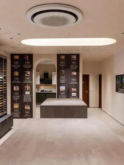 The journey of our 20 years in India is displayed alongside our material library in the Delhi showroom, telling the story of our brand's evolution.