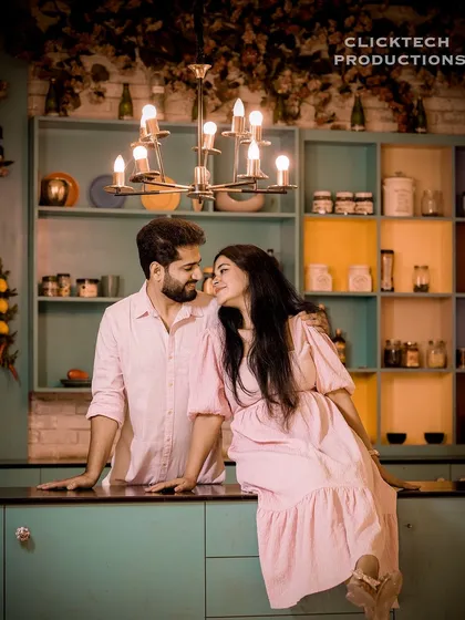 A sweet and romantic moment in our colorful kitchen set, perfect for a modern and fun pre-wedding shoot.