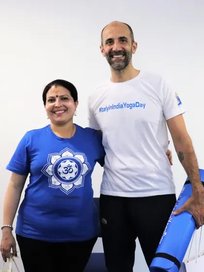A journey that transcends boundaries. Here I am with a student from another country, sharing the universal language of Iyengar yoga.