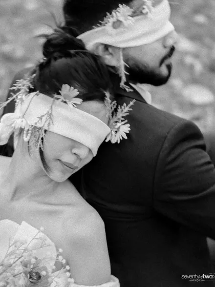 Leaning on him, her eyes covered. A powerful black and white portrait about finding your support and your home in another person, trusting them completely.
