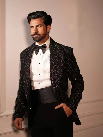 Introducing the Starry Black Tuxedo, featuring a subtle yet captivating abstract pattern. It offers a modern take on the classic black tuxedo, perfect for formal nights.