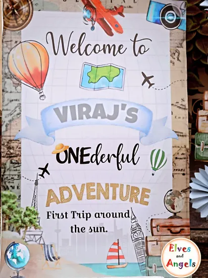 A personalized welcome sign for Viraj's 'Onederful Adventure' first birthday, celebrating his first trip around the sun.