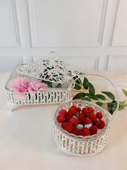 These versatile and beautifully crafted silver baskets are perfect for wedding gifts or adding a stylish touch to your home. They are functional, decorative, and full of character.