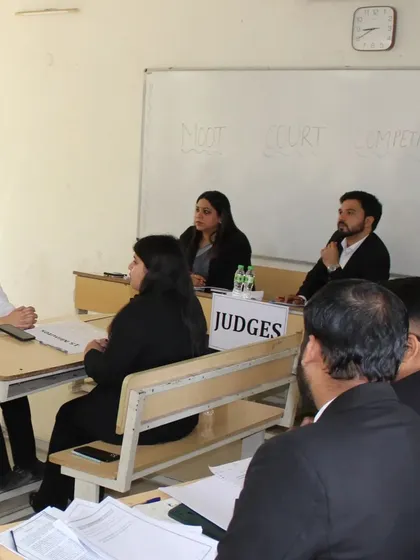 A student participant presents her case during the moot court competition at MDU Law College. As a judge, I focused on her command of the facts, her legal reasoning, and her ability to respond to questions, all key skills for a successful advocate.