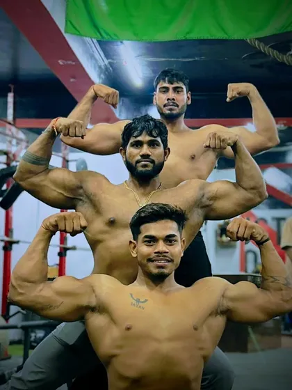 The bond of a team. Posing with my clients, we are all on this journey together. We push each other to be better, stronger, and more disciplined.