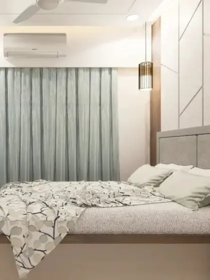 A final look at this serene bedroom, showcasing the comfortable bed and the stylish, modern decor.