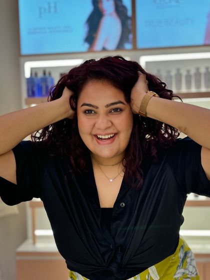 She is loving her new look, running her hands through her soft, defined curls. This is the result I aim for every time.