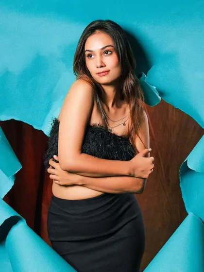 A softer moment from the torn paper shoot. This pose is more introspective, showing a different side of the story while still using the same powerful concept.