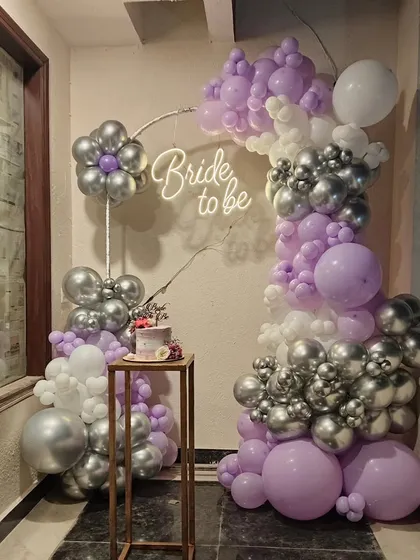 The "Bride to be" setup complete with a cake on the pedestal.