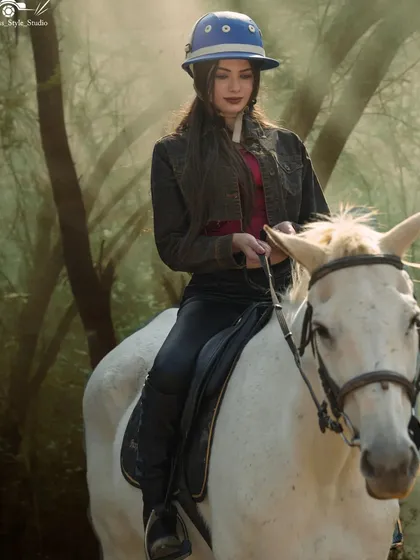 Ride into a scene that feels like a fairytale. This rider on a majestic white horse, surrounded by the misty morning light of the forest, captures the magical and almost therapeutic quality of our nature trails.