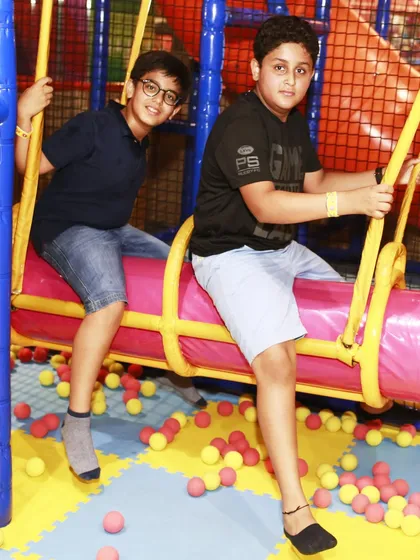 Older kids having a great time on the swing. Our 'My Maze' area is built to challenge and entertain kids from 5 to 9 years old.