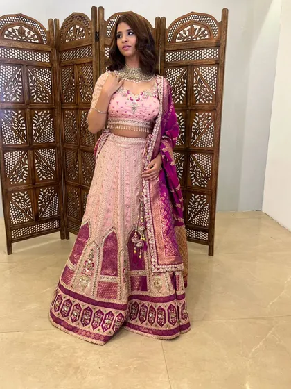 A full look at this unique pink and purple lehenga, perfect for a guest who loves color.