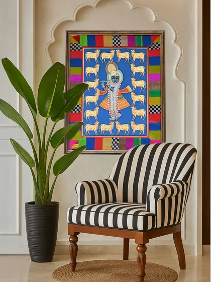 Here is a finished Pichwai painting, beautifully settled in its new home in Singapore. I created a custom fabric border using colorful studio offcuts, carefully pieced together to echo the vibrant palette of the artwork without overpowering it. It shows how a thoughtful frame can elevate a piece of art into a personal statement.