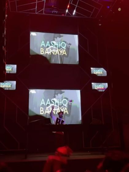 My audio-visual set in full swing at Sunburn Union, with lyrics from "Aashiq Banaya" lighting up the screens. It's all about creating a multi-sensory experience.