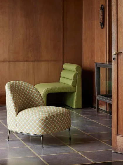 A study in modern geometry and bold design. This image features the "Vanity" and "Zig Zag" chairs, showcasing how we use unique forms and vibrant, patterned upholstery to create functional art that serves as a focal point in any sophisticated interior.