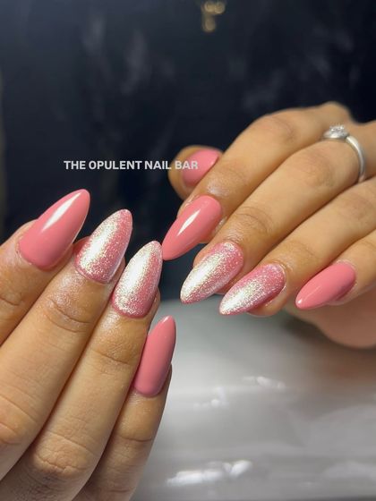 Sometimes you just need glitter. This set features a beautiful solid pink with two accent nails packed with iridescent glitter.