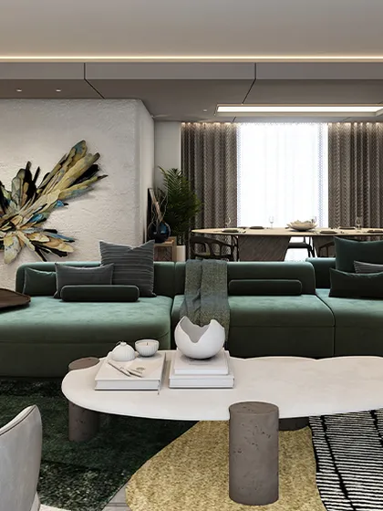 This living area is a calming sanctuary, offering a striking contrast to the fast-paced city energy. A bold, sculptural art piece and a uniquely shaped rug in shades of green add personality to the neutral backdrop, proving that true luxury is felt, not shouted.