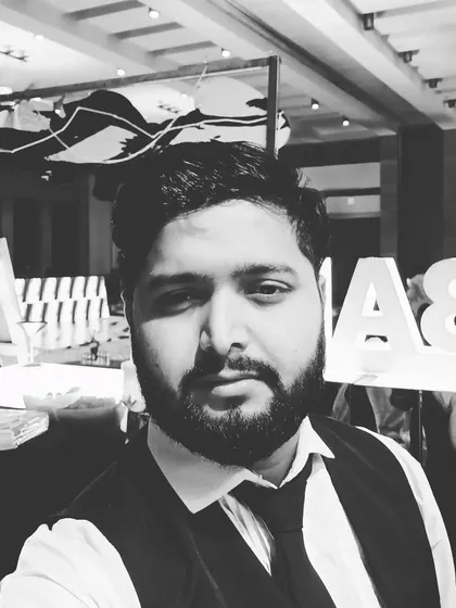 A quick photo of me, Amit, at an event. I personally oversee the details to make sure your bar experience is perfect.