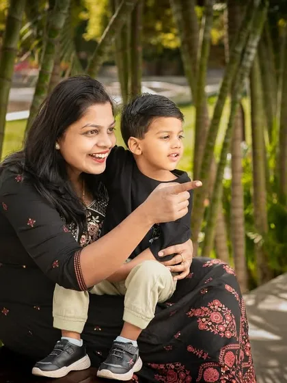 A mother and son exploring the park together. I love capturing these little moments of discovery and connection during our outdoor sessions.