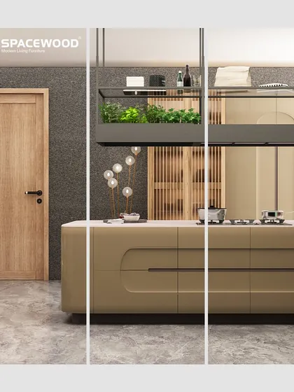 This kitchen features a uniquely curved island in an earthy tone, creating a soft and organic focal point. The overhead hanging shelf provides practical storage for bottles and plants without closing off the space.
