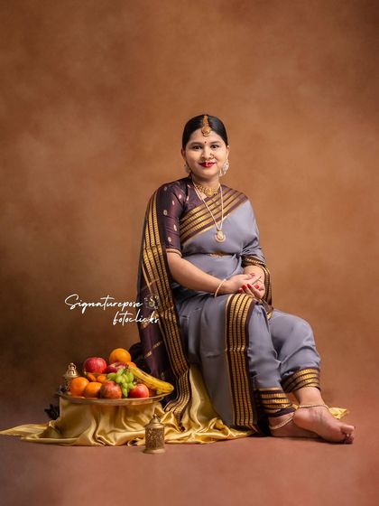 The composition of this seated portrait is balanced and classic, perfect for a timeless family heirloom.