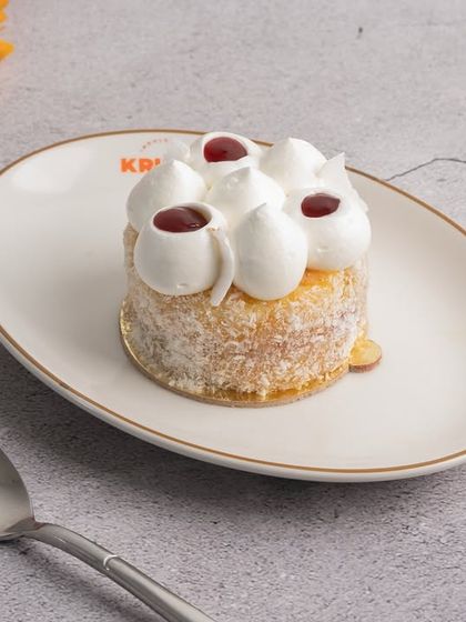 Our signature lamington is a classic for a reason. A light sponge cake coated in chocolate and coconut.