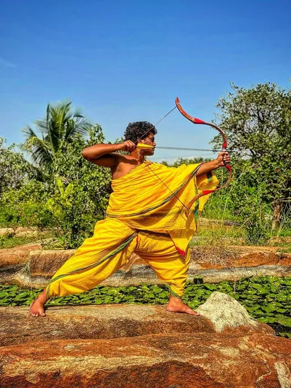 A warrior's greatest weapon is a mind sharpened by discipline and wisdom. Here, a student embodies this principle, his posture reflecting both physical strength and mental clarity.