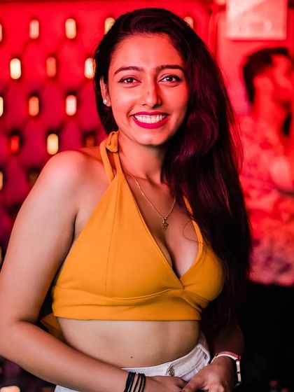 A guest smiling for the camera.