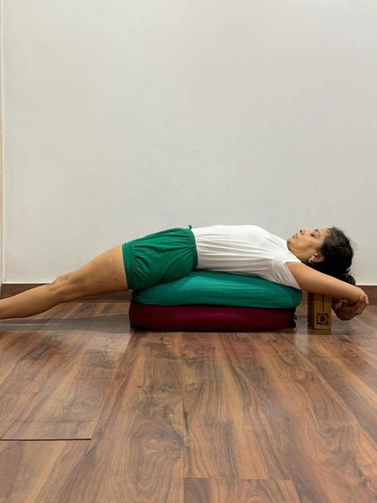 Using bolsters and blocks for a fully supported Purvottanasana. This passive version of the pose is excellent for cooling down, calming the nervous system, and gently opening the chest and shoulders.