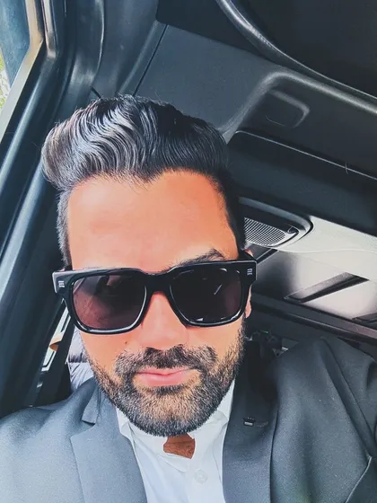 A selfie from inside my car, ready to get back to basics. The journey of life is like a path with an ocean ahead; one must be prepared for the challenges.