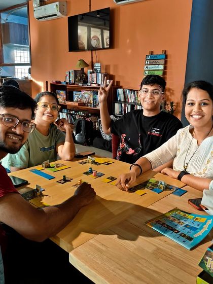 A game of 'Kingdomino' brings smiles to everyone's faces. It's one of the many family-friendly games available for our guests to enjoy.