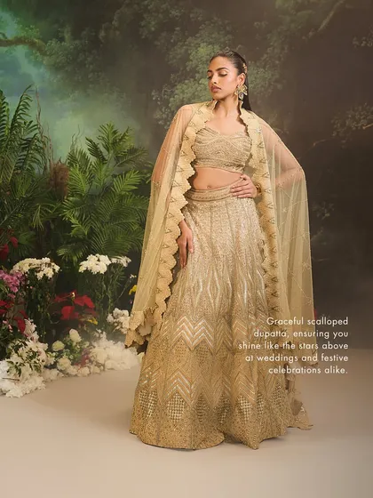 The full view of the Jade Lehenga Set, where the scalloped dupatta can be styled as a cape, adding a modern touch to this classic bridal ensemble.