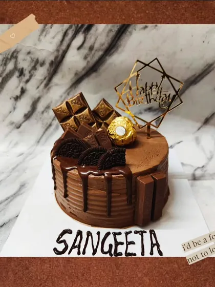 I'd be a fool not to love you, my "Dilbara." A rich Ferrero Rocher cake for all the chocolate lovers.