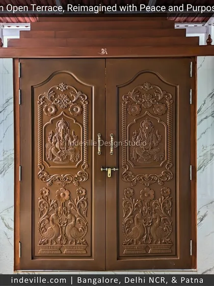 Craftsmanship is at the heart of my work. These intricately carved wooden doors were custom-built for a client's terrace temple, showcasing a deep respect for traditional artistry and creating a truly sacred entrance.