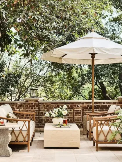 We designed this outdoor furniture set to create a luxurious and relaxing patio retreat. The collection, featuring deep-seated rattan armchairs with plush cushions and a matching coffee table, is built to withstand the elements while providing ultimate comfort and style for your garden or terrace.