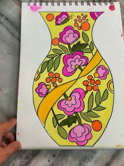 A close-up of the yellow floral vase design, showing the clean lines and balanced composition.