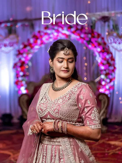 A candid and contemplative bridal portrait. This quiet moment before the festivities is a beautiful memory to capture.