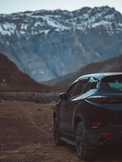 Using the rugged terrain of the Spiti Valley as a backdrop, this shot for a Tata Harrier emphasizes the car's tough and adventurous identity. The moody lighting and composition create a cinematic feel that people remember.