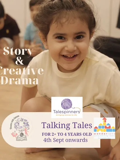 A happy face from our "Talking Tales" program. This story and creative drama class is designed for children aged 2 to 4.