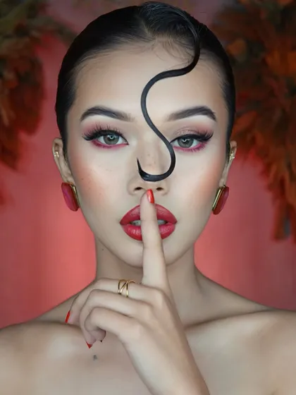 This is the level of creative and high-fashion makeup artistry you will learn to master. This look features a sculpted glow, a sharp crimson waterline, and a bold red lip, perfect for editorial shoots and building a standout portfolio.
