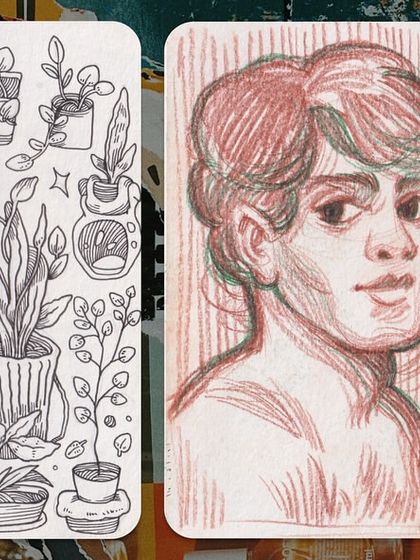 A page of botanical doodles next to some portrait studies. My sketchbook is a playground for any idea that comes to mind.