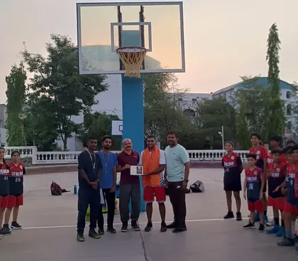 Coach Rohit being honored by SKM Basketball Academy for his contribution to growing basketball talent.