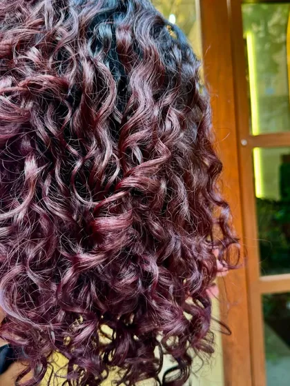 A close-up of the rich, multi-dimensional red and violet tones.