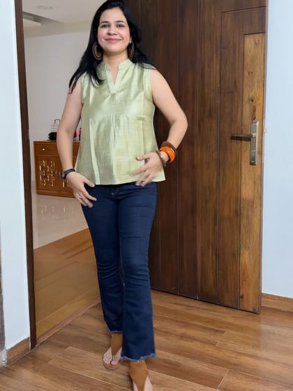 This light green sleeveless top was created from an old dress that I no longer wore. It's a simple way to get a brand new top for your jeans.